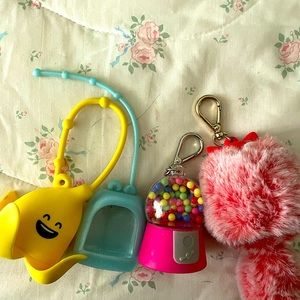 Bath and Body Works set of 4 sanitizer holders.